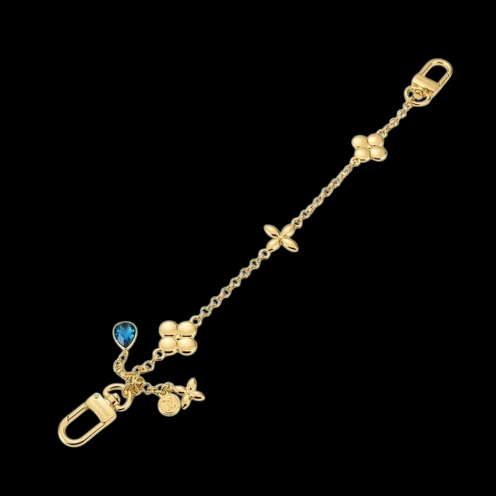 Elegant Gold Bag Chain/Charm with Blue Accent